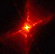Туманность Красный прямоугольник. Ядро туманности содержит умирающую звезду.